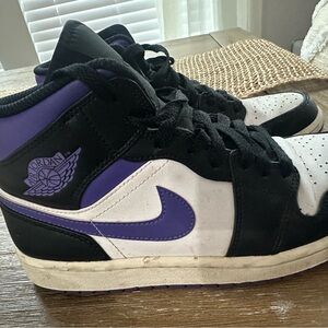 Air Jordan 1 Mid in black, white and purple
